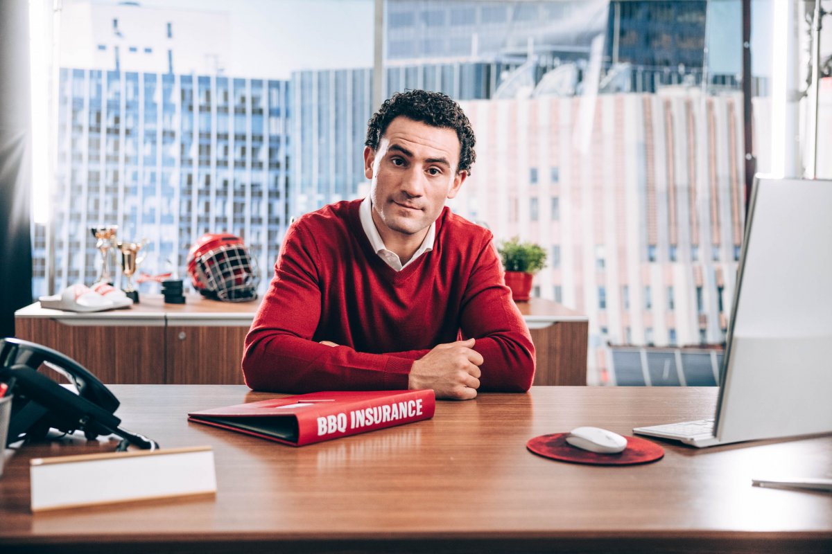 A man working for Budweiser BBQ Insurance